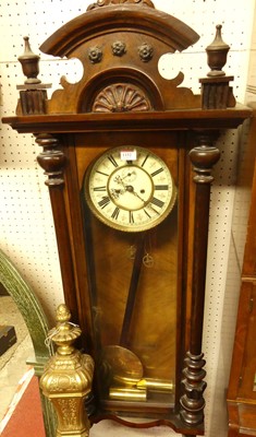 Lot 1152 - A circa 1900 Vienna walnut wall clock, having...