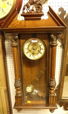 Lot 1162 - An early 20th century walnut droptrunk wall...