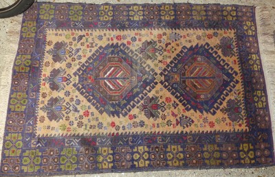 Lot 1170 - A Persian woollen blue ground Shiraz hall rug,...