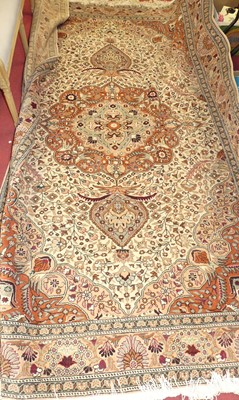 Lot 1180 - A Persian woollen red, pink and cream ground...