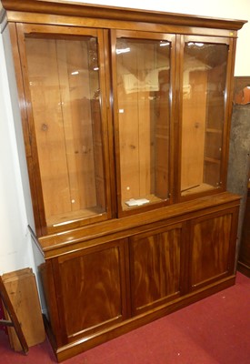 Lot 1187 - A late Victorian mahogany bookcase cupboard,...