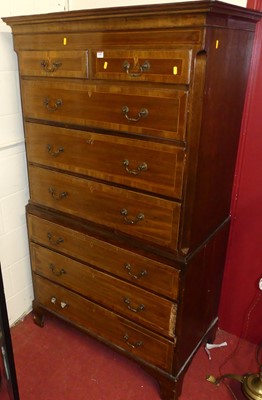 Lot 1190 - A George III walnut chest-on-chest, having two...