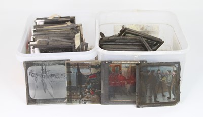 Lot 519 - A collection of vintage glass projector slides,...