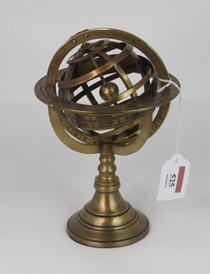 Lot 525 - A reproduction brass astrological globe, h.20cm