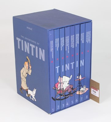 Lot 544 - Hergé; The Adventures of Tintin, eight volumes,...