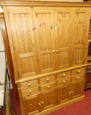 Lot 1200 - A contemporary pine linen cupboard, having...