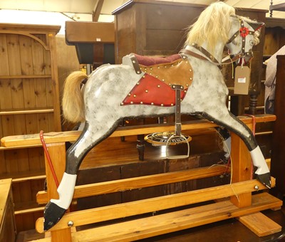 Lot 1207 - A dapple grey painted child's rocking horse,...