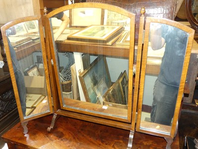 Lot 1215 - A mahogany triptych swing dressing mirror