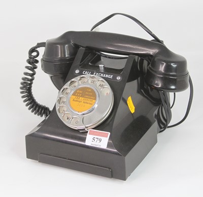 Lot 579 - A vintage style black rotary telephone