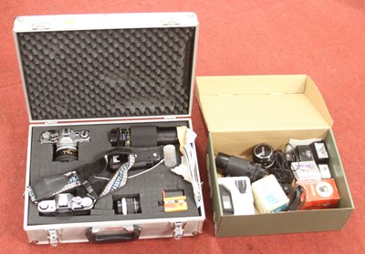 Lot 577 - A collection of cameras and photography...