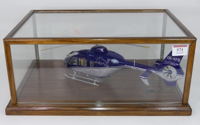 Lot 571 - A painted plastic model kit of a helicopter,...