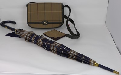 Lot 564 - After Burberry - a tartan lady's handbag,...