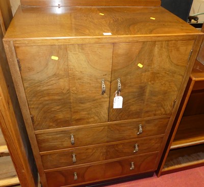 Lot 1251 - A 1930s figured walnut compactum, having twin...