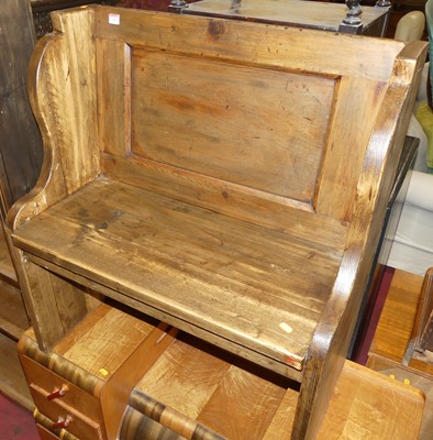 Lot 1254 - A stained rustic pine single bench seat settle,...