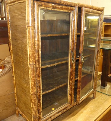 Lot 1262 - An early 20th century bamboo double door...