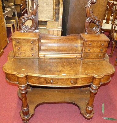 Lot 1264 - A mid-Victorian figured walnut Duchess...