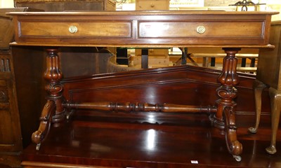 Lot 1268 - A mid-Victorian mahogany ledge back two drawer...