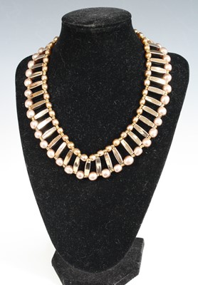 Lot 436 - An Egyptian style gilt metal and faux pearl...