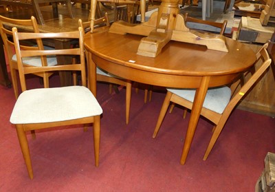 Lot 1297 - A 1960s teak D-end extending dining table,...