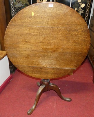 Lot 1308 - An early 19th century provincial oak circular...