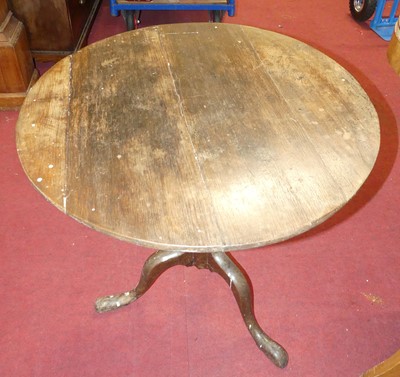 Lot 1311 - An early 19th century provincial oak circular...