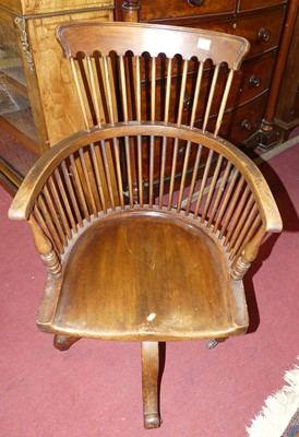 Lot 1352 - An early 20th century walnut tub comb back...