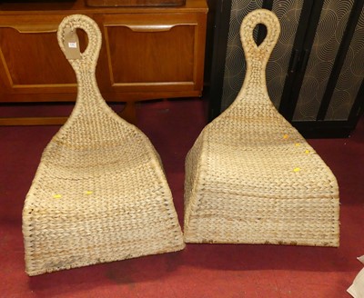 Lot 1366 - A pair of woven wicker lounge chairs, each...