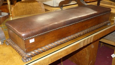 Lot 1317 - An early 20th century walnut and later tan...