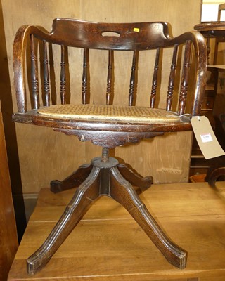 Lot 1380 - An early 20th century stained oak tub...