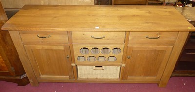 Lot 1381 - A contemporary joined blond oak dresser base,...