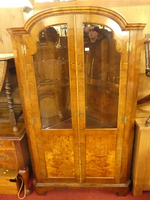 Lot 1382 - A figured walnut freestanding double door...