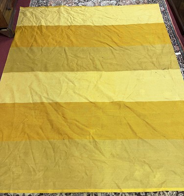 Lot 1393 - A machine woven yellow ground rug