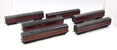 Lot 255 - Six 0-gauge metal-sided kit-built suburban...