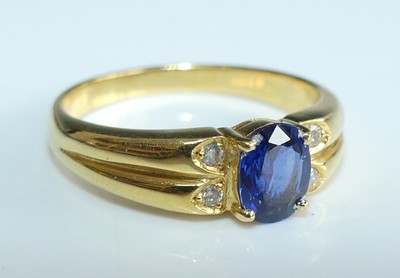 Lot 2282 - An 18ct gold sapphire and diamond dress ring,...