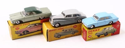 Lot 1320 - A Dinky Toys group of three diecast models to...