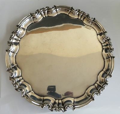 Lot 2203 - An Edwardian silver salver, of shaped circular...