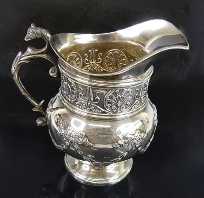 Lot 2144 - A late Victorian silver cream jug, of baluster...