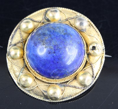 Lot 332 - A yellow metal target style memorial brooch,...