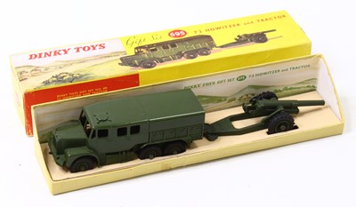 Lot 1313 - Dinky Toys No.695 7.2 Howitzer and Tractor set,...