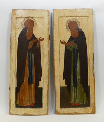 Lot 1241 - A pair of Russian icons depicting the Saints...