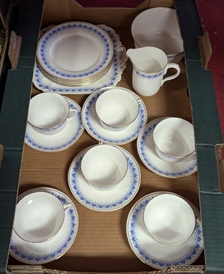 Lot 149 - A Shelley six place blue and gilt tea service,...