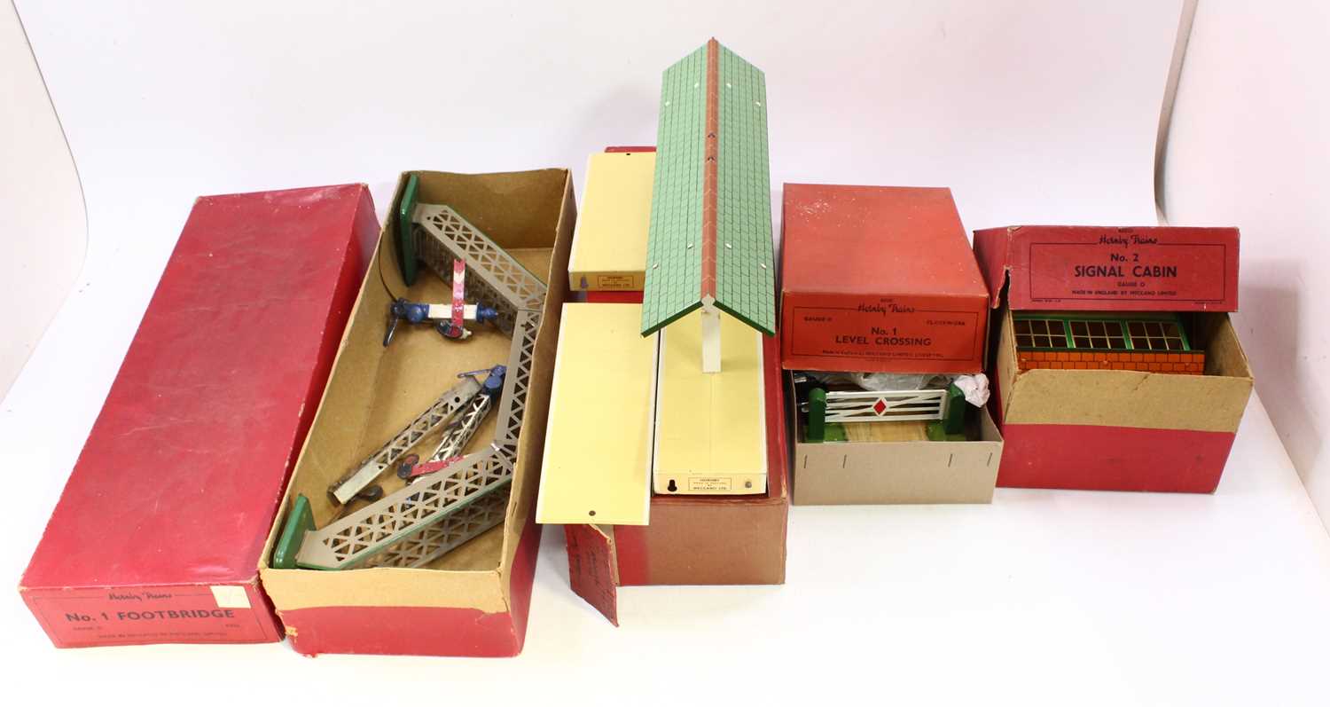 Lot 177 - A collection of Hornby 0 gauge buildings and...