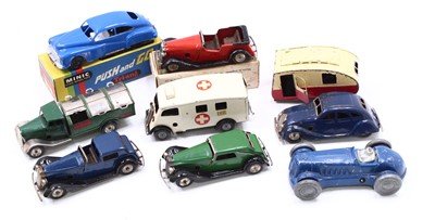 Lot 1923 - A small quantity of tin plate clockwork models...