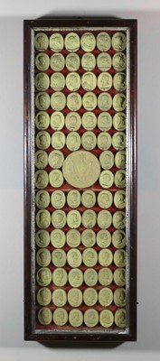 Lot 1103 - A framed display of 19th century wax intaglios,...