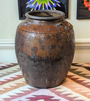 Lot 1023 - A Chinese brown glazed Martaban type...