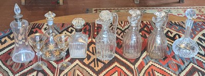 Lot 1061 - A collection of seven Georgian and later glass...