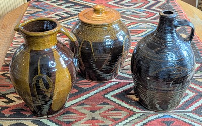 Lot 1028 - Winchcombe Pottery, a cider flagon, incised...