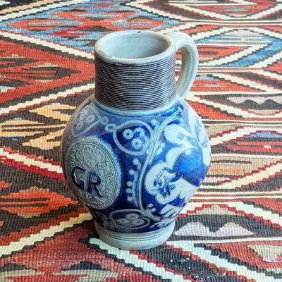 Lot 1040 - A Westerwald stoneware jug, early 18th century,...