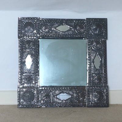 Lot 1298 - An eastern pressed metal square wall mirror,...