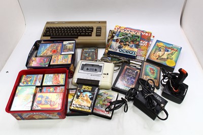 Lot 2011 - A box containing Commodore 64 video games and...